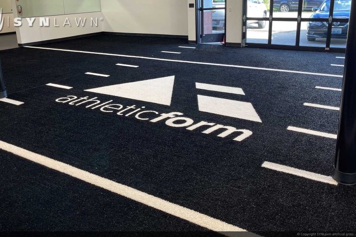 SYNLawn Miami FL prefab turf logos for athletic weight room applications